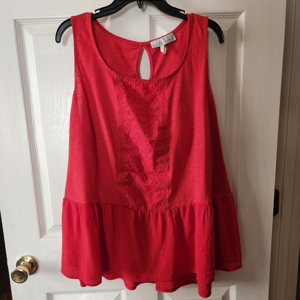 Flowy red tank with eyelet detailing
